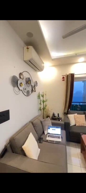 Living Room in 3 BHK Apartment at Paramount Floraville, Sector 137 – for Sale