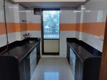 Kitchen in 2 BHK Apartment at Sandstone CHS Ltd, Mira Road – for Sale