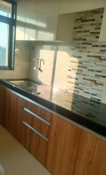 Kitchen in 2 BHK Apartment at Adityaraj Breeze, Vikhroli East – for Rent