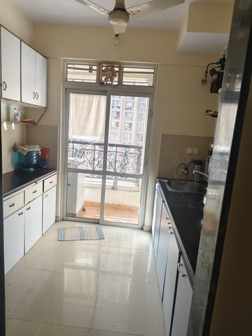 Kitchen in 1 BHK Apartment at Hiranandani Estate Penrith, Ghodbunder Road – for Rent