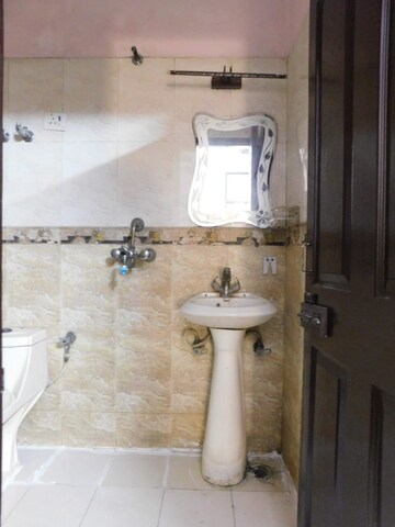 Bathroom in 3 BHK Builder Floor at Chahak Plaza, Shakti Khand – for Rent