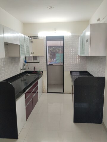 Kitchen in 2.5 BHK Apartment at Satyam Rajyog, Dhanori – for Rent
