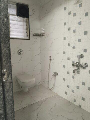 Bathroom in 2.5 BHK Apartment at Satyam Rajyog, Dhanori – for Rent