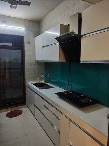 Kitchen in 2 BHK Apartment at NRI Complex Phase 2, Seawoods – for Rent