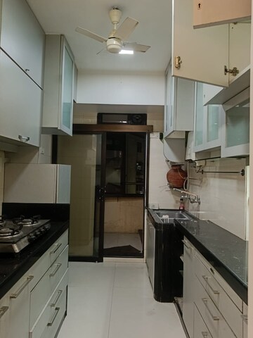 Kitchen in 3 BHK Apartment at Lokhandwala Harmony, Worli – for Rent
