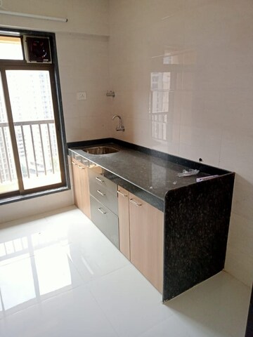 Kitchen in 1 BHK Apartment at Puraniks Glorio Grand Central, Vartak Nagar – for Sale