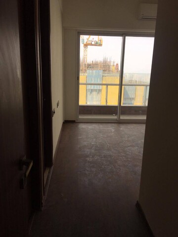 Building Lobby in 2 BHK Apartment at Omkar Alta Monte, Malad East – for Rent
