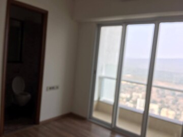 Building Lobby in 2 BHK Apartment at Omkar Alta Monte, Malad East – for Rent