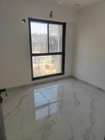 Room in 2 BHK Apartment at Dev Leo Tower, Oshiwara – for Rent
