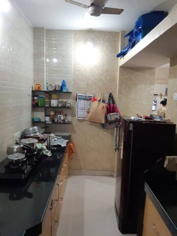 Kitchen in 1 BHK Apartment at Brahmand CHS, Brahmand – for Sale