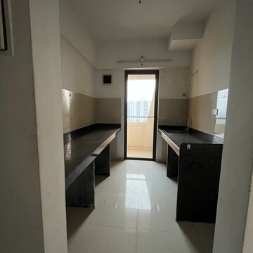 Kitchen in 1 BHK Apartment at Lodha Palava Fontana C To H, Taloja Bypass Road – for Rent
