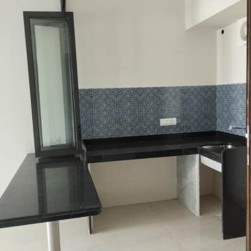Kitchen in 1 BHK Apartment at Lodha Quality Home Tower 2, Saket Complex – for Rent