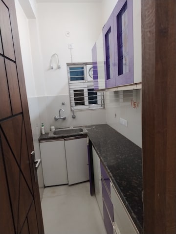 Kitchen in 2 BHK Apartment at Rishita Manhattan, Gomti Nagar – for Rent