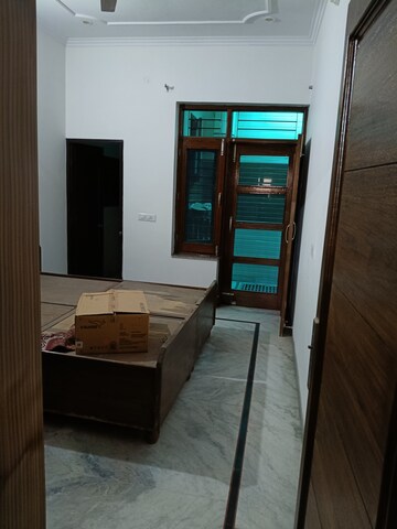 Bedroom in 2 BHK Builder Floor at Guru Nanak Enclave, Dhakoli Village – for Rent
