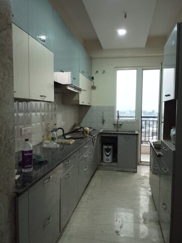 Kitchen in 4 BHK Apartment at Saya Gold Avenue, Vaibhav Khand – for Rent