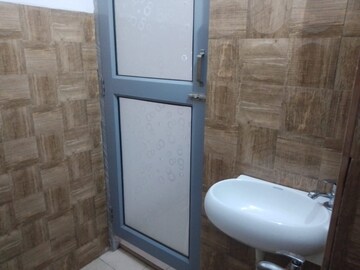 Bathroom in 3 BHK Apartment at Gautam Nagar – for Rent