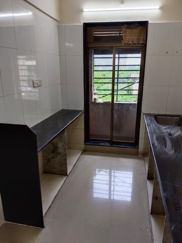 Kitchen in 2 BHK Apartment at Shree Gokuldham CHS, Kharghar – for Rent