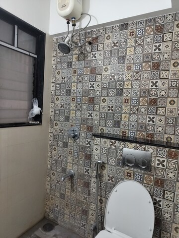 Bathroom in 2 BHK Apartment at Ravima Newton Homes, Hadapsar – for Rent