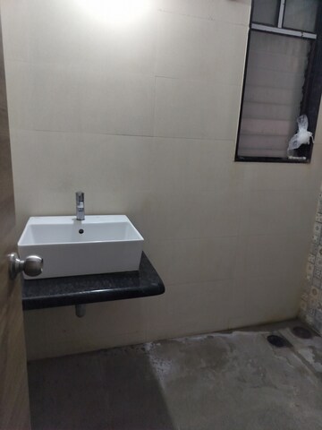 Bathroom in 2 BHK Apartment at Ravima Newton Homes, Hadapsar – for Rent
