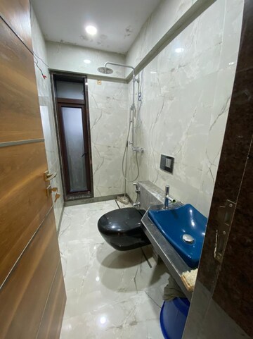 Bathroom in 4 BHK Apartment at HDIL Metropolis Residences, Andheri West – for Sale