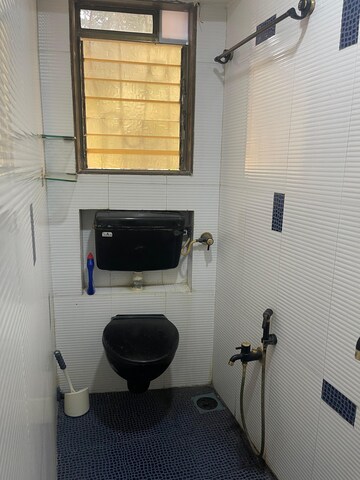 Bathroom in 1 BHK Apartment at Sun N Sea, Andheri West – for Rent