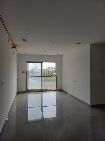 Building Lobby in 2 BHK Apartment at Dev Leo Tower, Oshiwara – for Rent