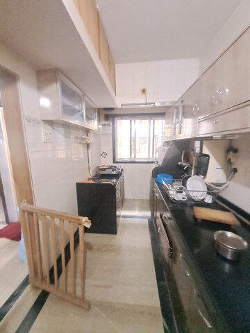Kitchen in 2 BHK Apartment at Vishwakarma Tower, Kharghar – for Rent