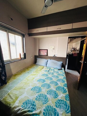 Bedroom in 2 BHK Apartment at Gurusai Sai Sundaram, Kharadi – for Rent