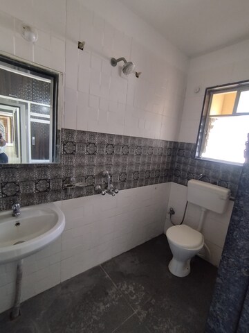 Kitchen in 2 BHK Apartment at Gurusai Sai Sundaram, Kharadi – for Rent