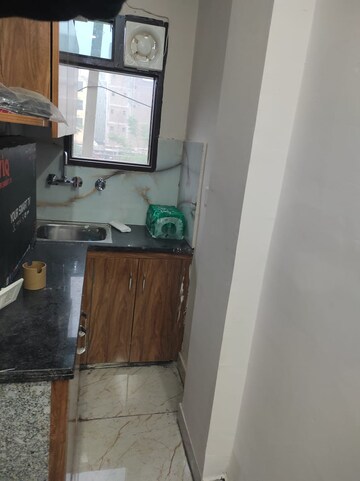 Kitchen in 1 RK Apartment at Unitech Arcadia, South City 2 – for Rent
