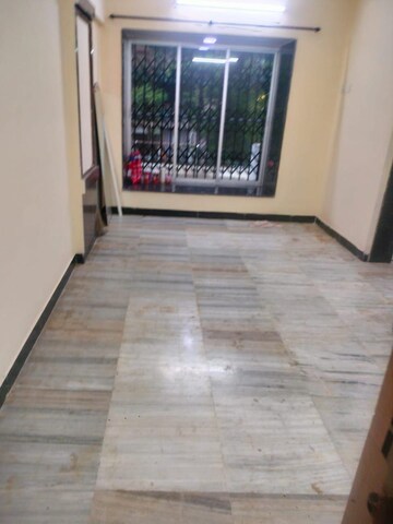 Room in 2 BHK Apartment at Parasmani CHS Borivali, Borivali West – for Rent