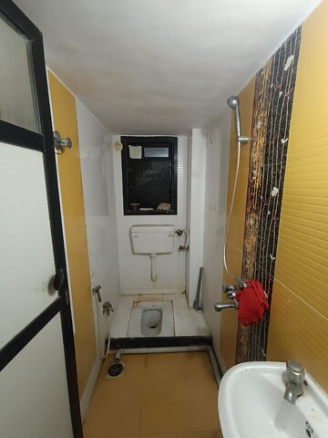 Bathroom in 2 BHK Apartment at Poonam Palms, Nalasopara West – for Sale