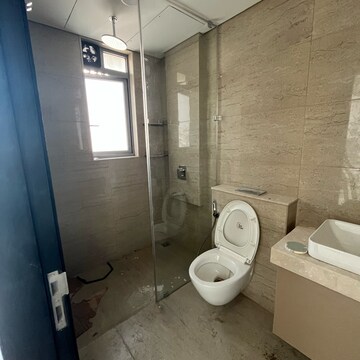 Bathroom in 3 BHK Apartment at Oberoi Sky City, Khande Rao Dongari – for Rent