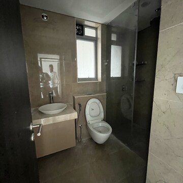 Bathroom in 3 BHK Apartment at Oberoi Sky City, Khande Rao Dongari – for Rent