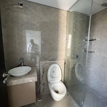 Bathroom in 3 BHK Apartment at Oberoi Sky City, Khande Rao Dongari – for Rent