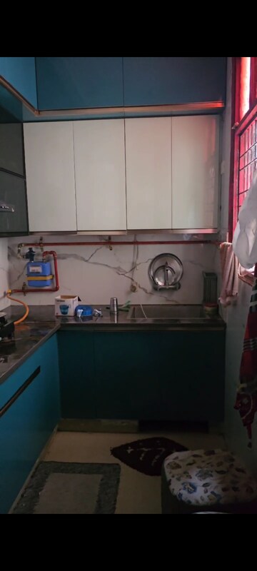 Kitchen in 2 BHK Apartment at Meenal Balmukund Residency, Raj Nagar Extension – for Sale