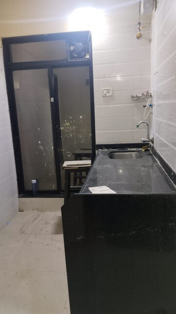 Kitchen in 1.5 BHK Apartment at Ghansoli Sector 21 – for Rent