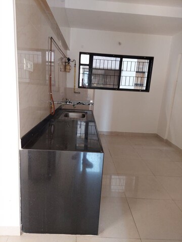 Kitchen in 3.5 BHK Apartment at Mantra Sky Homes, Magarpatta City – for Sale