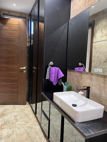 Bathroom in 3 BHK Builder Floor at Ansal Sushant Lok I, Sector 43 – for Rent