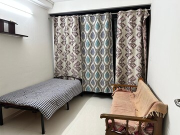 Living Room in 2 BHK Apartment at Duville Riverdale Heights, Kharadi – for Rent