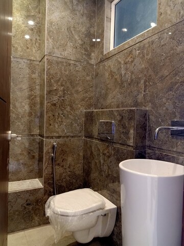 Bathroom in 3 BHK Builder Floor at Ansal Sushant Lok I, Sector 43 – for Rent