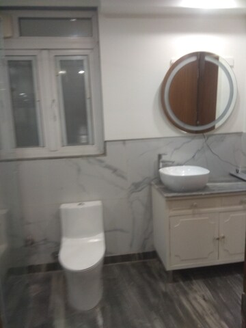 Bathroom in 4 BHK Builder Floor at New Friends Colony – for Rent