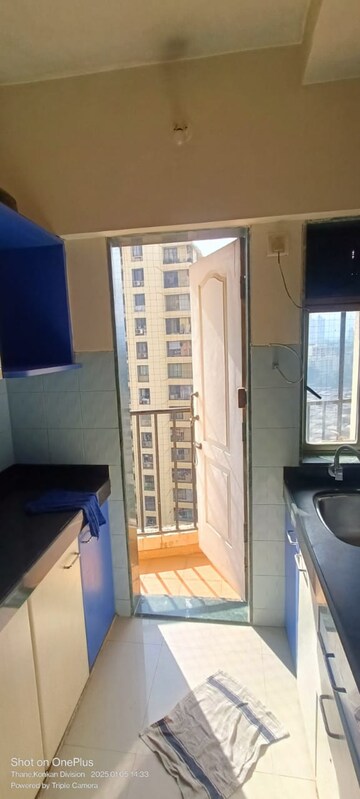Kitchen in 2 BHK Apartment at Everest World Aspen, Dhokali – for Sale