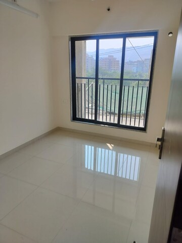 Room in 2 BHK Apartment at Virani Sky Heights, Kausa – for Sale