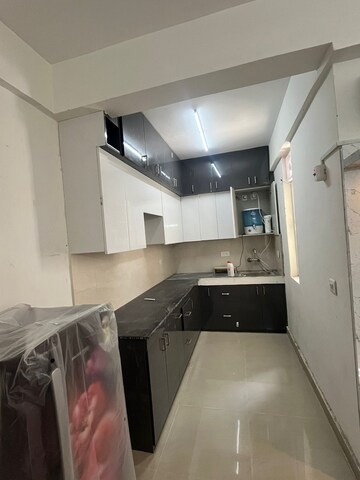 Kitchen in 2 BHK Apartment at Suncity Avenue 76, Sector 76 – for Rent