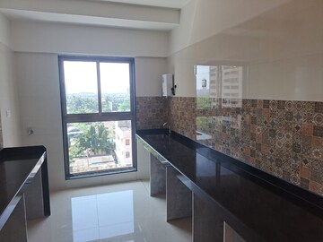 Kitchen in 3 BHK Apartment at Rajesh Raj Infinia, Malad West – for Rent