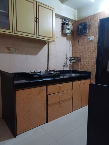 Kitchen in 1 BHK Apartment at Vimla Plaza, Ghansoli – for Rent