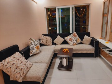 Living Room in 2 BHK Apartment at Rustomjee Azziano Wing D, Majiwada – for Rent