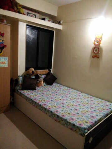 Bedroom in 2 BHK Apartment at Belvalkar Chaitanyanagari, Warje – for Rent