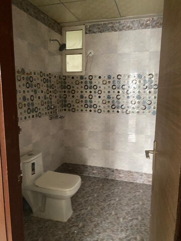 Bathroom in 4 BHK Apartment at Saya Gold Avenue, Vaibhav Khand – for Sale